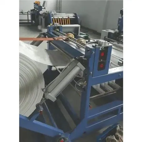 Jumbo bossa de tall i màquina de cosir